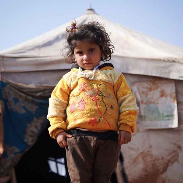 GO report cover image, portrait of refugee child